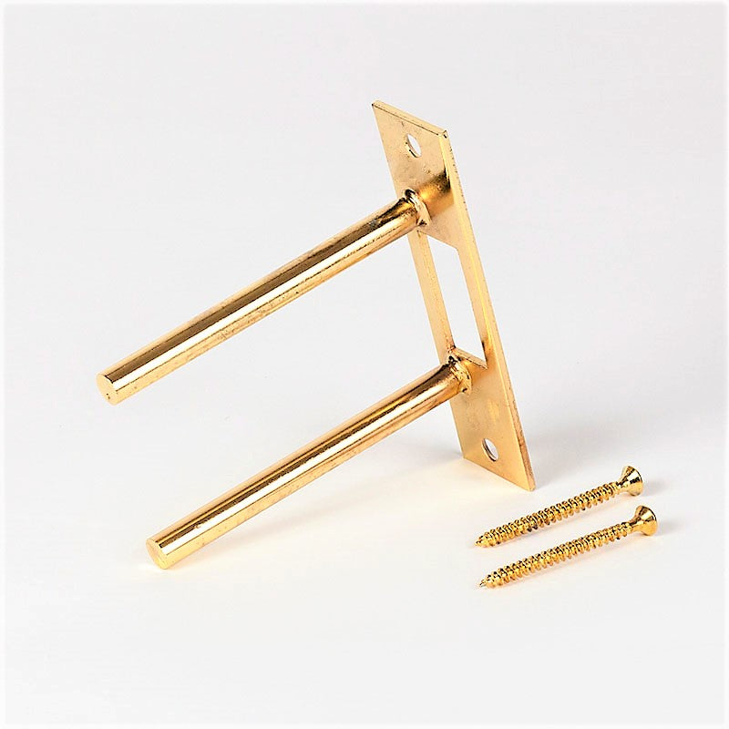 Two-post strike plate by Tuff Strike in polished brass finish, side view on a white background.