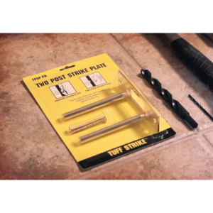The Tuff Strike two-post strike plate packaged for shipping, showing the brand logo and product name.